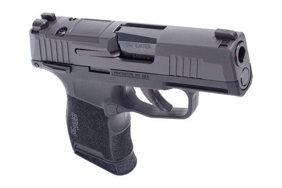 Micro-compact 9mm pistol with black polymer frame.